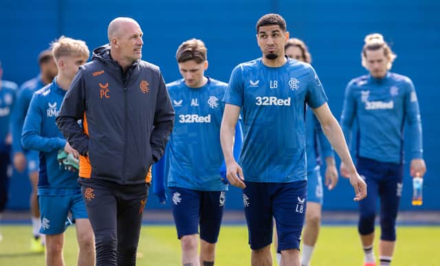 Rangers manager Philippe Clement and defender Leon Balogun in conversation during a training session