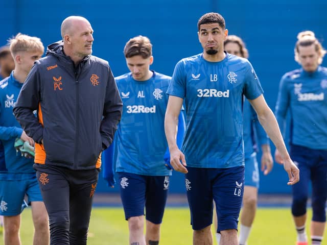 Rangers manager Philippe Clement and defender Leon Balogun in conversation during a training session